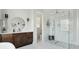 Modern bathroom showcasing dual vanities, and a glass-enclosed shower at 1537 Tomato Farm Cir, Mount Pleasant, SC 29464