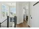 Hallway featuring windows, hardwood floors, and an elevator at 1537 Tomato Farm Cir, Mount Pleasant, SC 29464