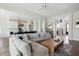 Spacious living area that seamlessly connects to the modern kitchen and staircase at 1537 Tomato Farm Cir, Mount Pleasant, SC 29464