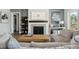 Inviting living room with fireplace, comfortable seating, and stylish wooden coffee table at 1537 Tomato Farm Cir, Mount Pleasant, SC 29464