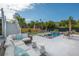 Spacious outdoor living area featuring a pool, seating, and beautifully landscaped areas at 1537 Tomato Farm Cir, Mount Pleasant, SC 29464