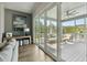 Cozy sunroom with sliding glass doors, modern decor, and comfortable seating for relaxation at 1537 Tomato Farm Cir, Mount Pleasant, SC 29464