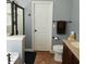 Bathroom featuring shower stall, vanity sink, toilet, and neutral-toned floor at 169 Woodbrook Way, Moncks Corner, SC 29461