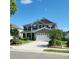 Beautiful two-story home with a well-manicured lawn and attached garage at 169 Woodbrook Way, Moncks Corner, SC 29461