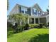 Charming home with beautiful landscaping and well-maintained lawn at 169 Woodbrook Way, Moncks Corner, SC 29461