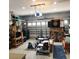 Well-lit two car garage with ample storage space, game area, and an automatic door opener at 169 Woodbrook Way, Moncks Corner, SC 29461
