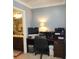 Dedicated office space with built-in desk and natural light located adjacent to the bathroom at 169 Woodbrook Way, Moncks Corner, SC 29461