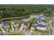 Bird's-eye view of homes in a neatly planned neighborhood featuring a street with palm trees at 1740 Agate Bay Dr, Mount Pleasant, SC 29466