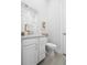 Modern bathroom featuring a vanity with marble countertop, a toilet, and stylish decor at 1740 Agate Bay Dr, Mount Pleasant, SC 29466