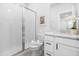 Beautiful, naturally lit bathroom with tiled shower, decorative art, and modern fixtures at 1740 Agate Bay Dr, Mount Pleasant, SC 29466