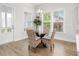 Cozy dining area with natural light, a glass table, and a view to the exterior at 1740 Agate Bay Dr, Mount Pleasant, SC 29466