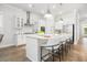 Bright, open kitchen with a large island, stainless steel appliances, and stylish pendant lighting at 1740 Agate Bay Dr, Mount Pleasant, SC 29466