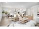 Inviting living room with neutral tones, recessed lighting, and an open layout into the modern kitchen at 1740 Agate Bay Dr, Mount Pleasant, SC 29466