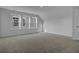 Bedroom with neutral carpet and three windows providing natural light at 199 Belfort Pl, Summerville, SC 29486