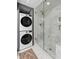 Tiled shower with glass doors, conveniently located next to the laundry for easy access at 2 Francis St # H, Charleston, SC 29403