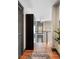 Hallway featuring hardwood floors, and balcony access at 2 Francis St # H, Charleston, SC 29403