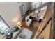 Open floor plan with living and kitchen area; featuring modern staircase at 2 Francis St # H, Charleston, SC 29403