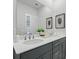 Bright bathroom with a double vanity, a quartz countertop, chrome faucets and minimalist decor at 207 Somerset Acres Dr, Summerville, SC 29486
