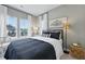Cozy bedroom with a comfortable bed, neutral decor, and large windows offering natural light at 207 Somerset Acres Dr, Summerville, SC 29486