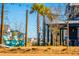 Community lawn area with Adirondack chairs and views of the neighborhood homes at 207 Somerset Acres Dr, Summerville, SC 29486