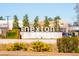 Beautiful Nexton community signage surrounded by landscaping and local businesses, providing a welcoming and vibrant atmosphere at 207 Somerset Acres Dr, Summerville, SC 29486