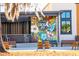 Page's Okra Grill exterior featuring colorful murals, outdoor seating, and a welcoming atmosphere for casual dining at 207 Somerset Acres Dr, Summerville, SC 29486
