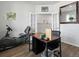 Functional home office featuring a desk, exercise equipment, and ample lighting for comfortable work at 211 Squire Pope Rd, Summerville, SC 29486