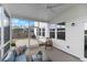 Inviting screened porch with a comfortable chair and a view of the backyard at 211 Squire Pope Rd, Summerville, SC 29486