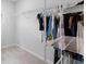 A roomy walk-in closet equipped with metal shelving for organized storage and easy access to your wardrobe at 211 Squire Pope Rd, Summerville, SC 29486
