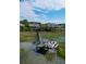 Scenic aerial of boat dock with lift, home, and waterway access for waterfront enjoyment at 2128 Breezy Point Dr, Mount Pleasant, SC 29466