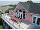 Spacious balcony with a large dining table, perfect for outdoor entertaining with stunning views at 2128 Breezy Point Dr, Mount Pleasant, SC 29466