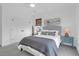 Comfortable bedroom featuring a queen bed, stylish bedside tables, and ample natural light, creating a peaceful retreat at 2128 Breezy Point Dr, Mount Pleasant, SC 29466