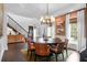 Elegant dining room with a round table, natural light, and stylish decor, perfect for entertaining at 2128 Breezy Point Dr, Mount Pleasant, SC 29466
