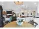 Open concept kitchen and living room with an island, pendant lighting, and sleek finishes at 2128 Breezy Point Dr, Mount Pleasant, SC 29466