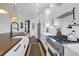 Gourmet kitchen featuring white cabinets, stainless steel appliances, an island, and wood countertop at 2128 Breezy Point Dr, Mount Pleasant, SC 29466