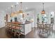 Modern kitchen with white cabinetry, a large island with seating, and stainless steel appliances at 2128 Breezy Point Dr, Mount Pleasant, SC 29466