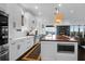Spacious kitchen with an island, white cabinets, stainless steel appliances, and wood countertop at 2128 Breezy Point Dr, Mount Pleasant, SC 29466