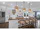 Bright, open kitchen with a large island, white cabinets, stainless steel appliances, and wood countertop at 2128 Breezy Point Dr, Mount Pleasant, SC 29466