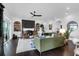 Bright living room with a fireplace, stylish shelving, and an open layout for entertaining guests at 2128 Breezy Point Dr, Mount Pleasant, SC 29466