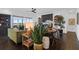 Spacious living room with stylish decor, including a fireplace, seating, and an open view of the outdoors at 2128 Breezy Point Dr, Mount Pleasant, SC 29466