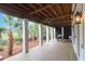 Covered porch offering ample space and featuring wood-paneled ceilings at 2128 Breezy Point Dr, Mount Pleasant, SC 29466