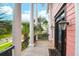 Charming porch with elegant columns, beautiful front door, and stylish outdoor lighting at 2128 Breezy Point Dr, Mount Pleasant, SC 29466