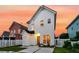 Charming two-story white home with a well-manicured lawn and a welcoming driveway at 221 Trillium Ave, Summerville, SC 29483