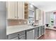 Updated kitchen featuring stainless steel appliances, modern countertops, and wood floors at 221 Trillium Ave, Summerville, SC 29483