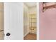 Organized walk-in closet with adjustable wire shelving and rods for efficient storage solutions at 221 Trillium Ave, Summerville, SC 29483