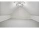 Attic space featuring painted walls, sealed flooring, and a gable roof at 225 Baxter Ln, Walterboro, SC 29488