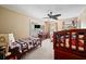 bedroom with ceiling fan and sports-themed decor at 225 Baxter Ln, Walterboro, SC 29488
