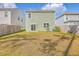 Spacious backyard featuring lush green grass, a privacy fence, and ample space for recreation at 260 Sweet Cherry Ln, Summerville, SC 29486