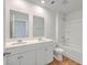 Bright bathroom featuring double sinks, a shower-tub combination, and sleek fixtures at 260 Sweet Cherry Ln, Summerville, SC 29486