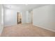 Bedroom features neutral carpet with an open door to bathroom at 260 Sweet Cherry Ln, Summerville, SC 29486